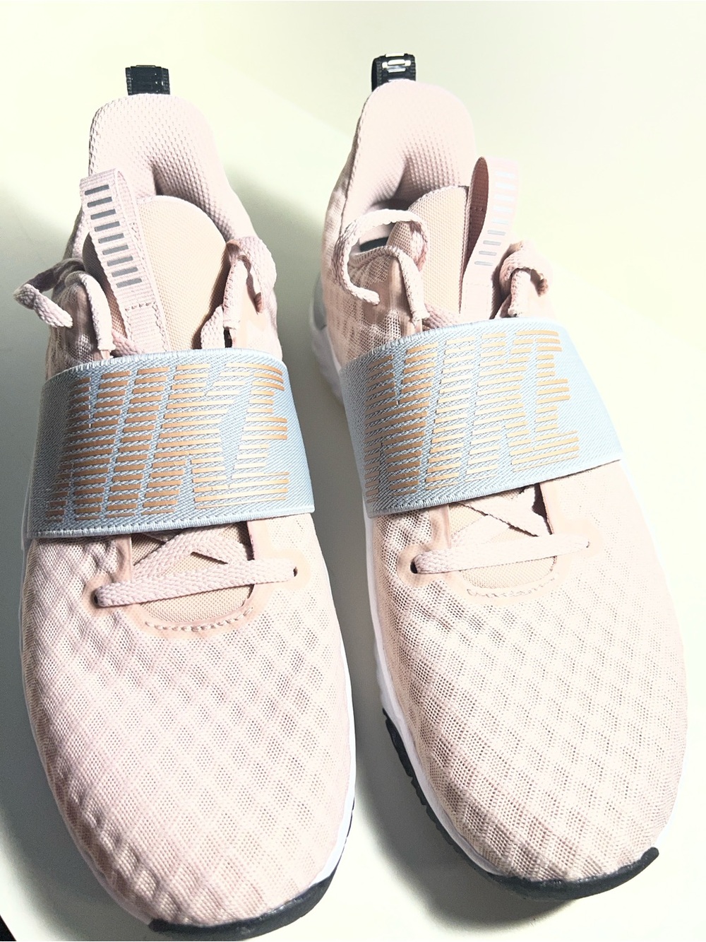 Nike Women's Slip-On Sneakers in Light Pink with Pale Blue Strap